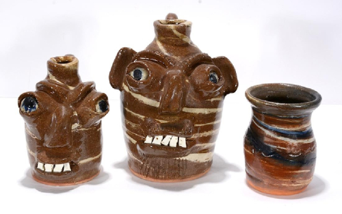 Two Bug-Eyed Swirl Face Jugs + Vase