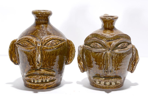 Pair of Alien Face Jugs